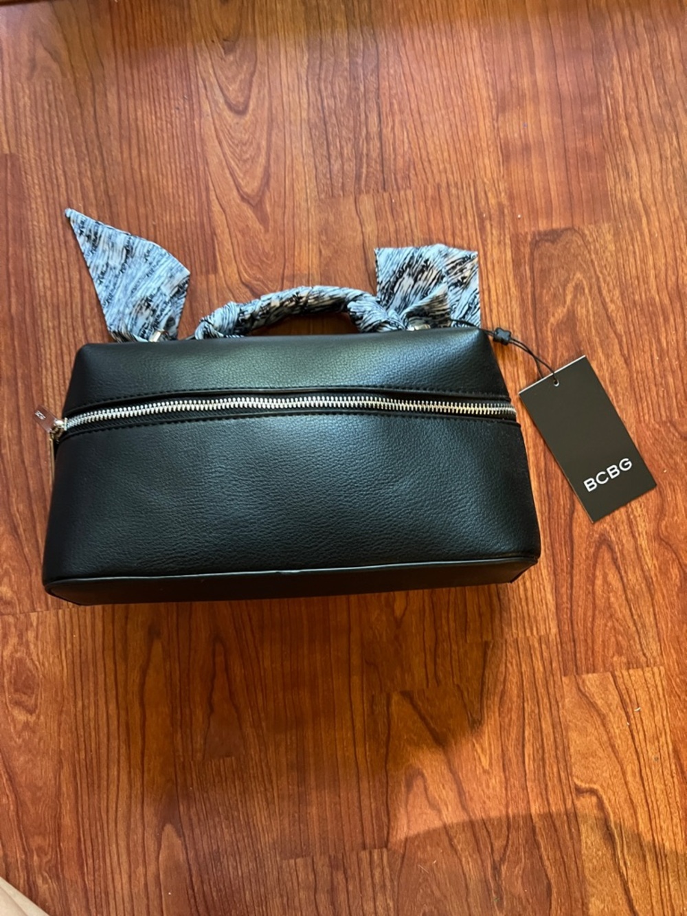 NWT BCBG Black Faux Leather handbag with Patterned Handle